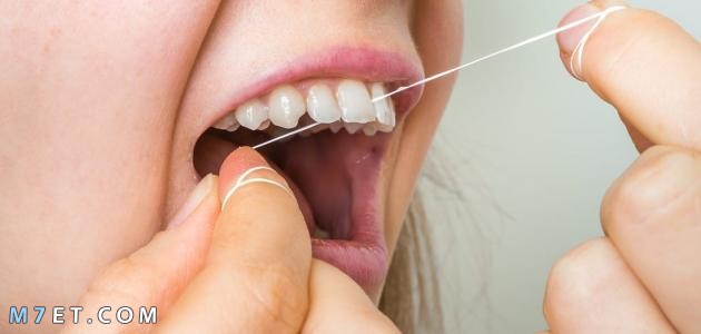 كيفية استخدام خيط الأسنان