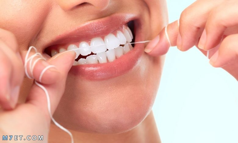 كيف استخدم خيط الاسنان