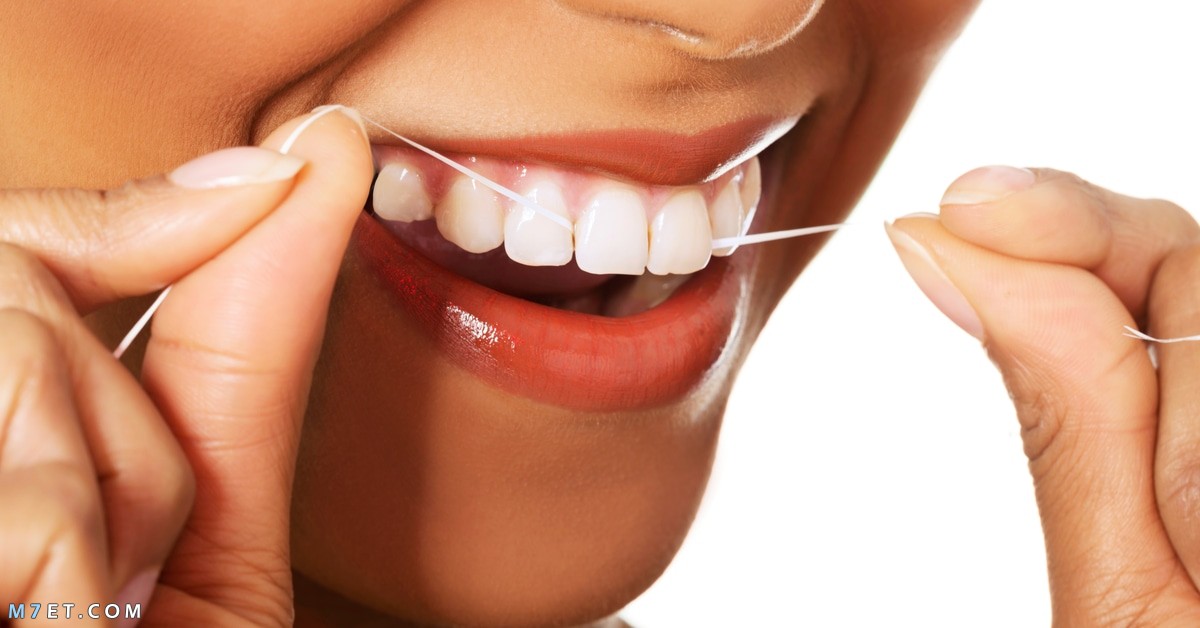 كيف استخدم خيط الاسنان