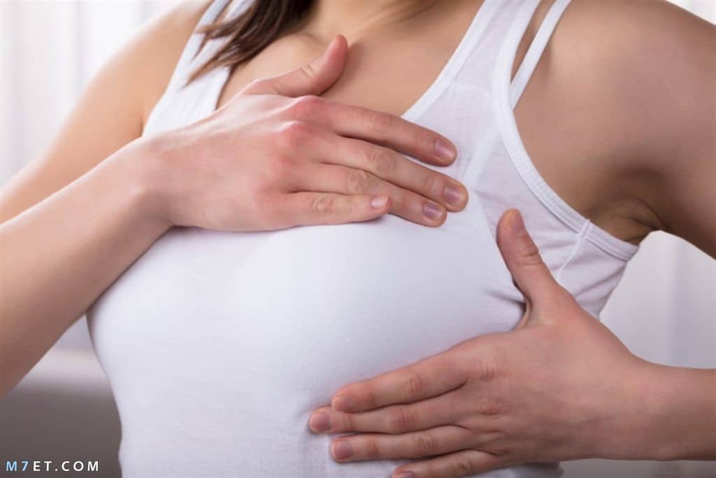 هل ألم الثدي بعد الدورة من علامات الحمل